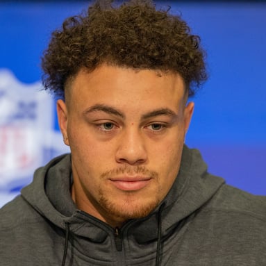 Headshot of Theo Johnson